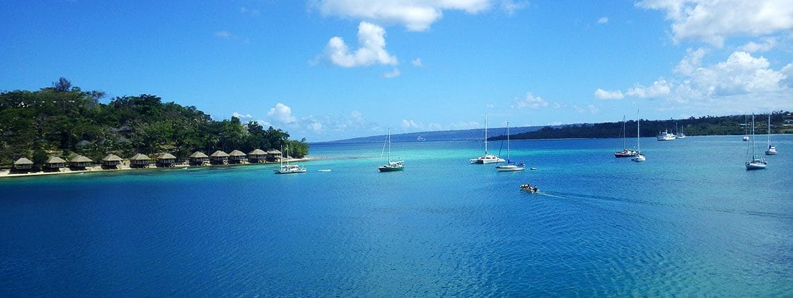 Vanuatu Island bay with boats
